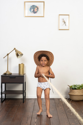 Boy holding a rope