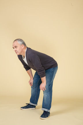 Man in casual clothes posing