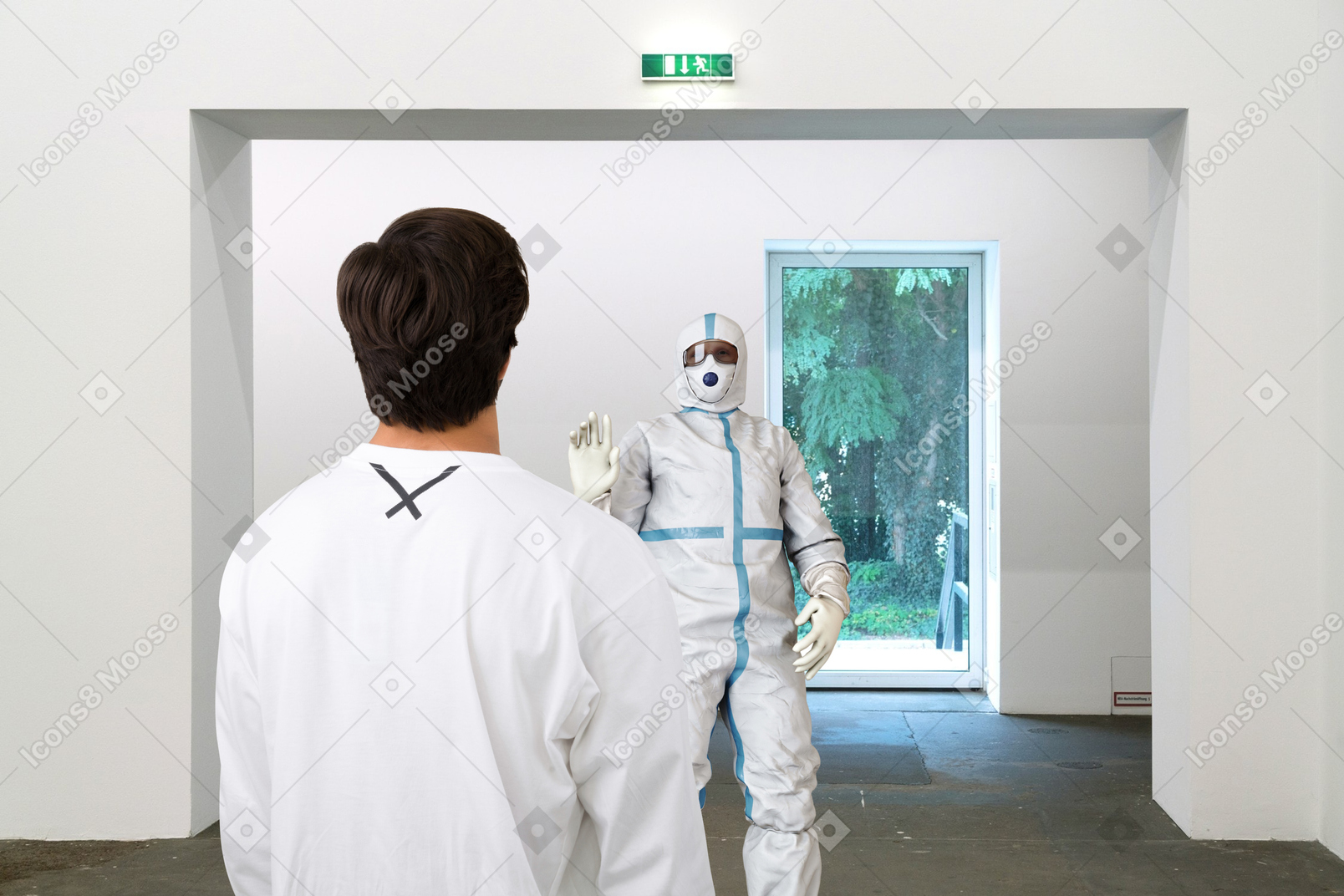 Person in protective suit stopping a man