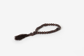 Prayer beads on white background