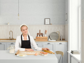 Hermosa joven ama de casa en la cocina moderna