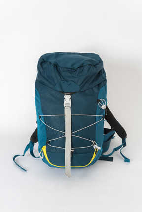 Blue tourist backpack on white background