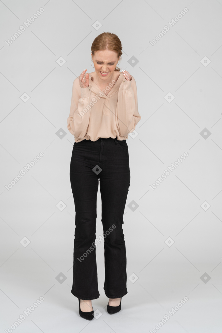 Woman in beautiful blouse standing