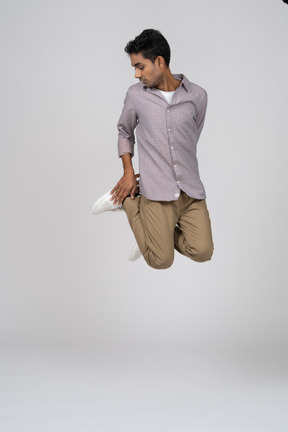 Man in casual clothes jumping