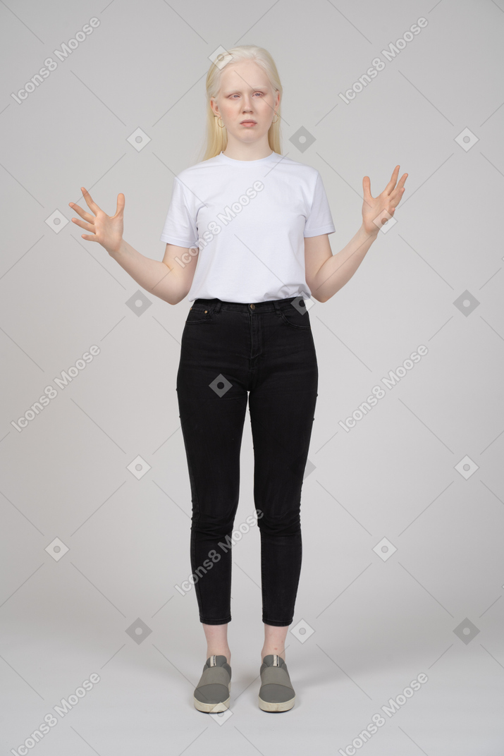 Young woman in casual clothes gesturing