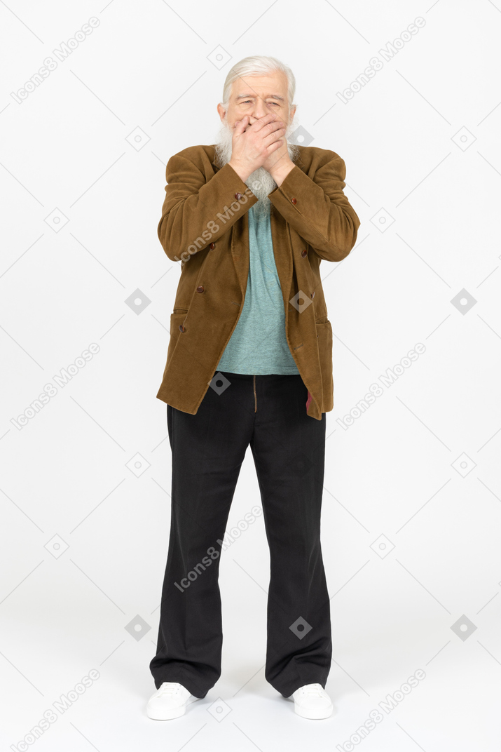 Elderly man covering mouth and looking sick