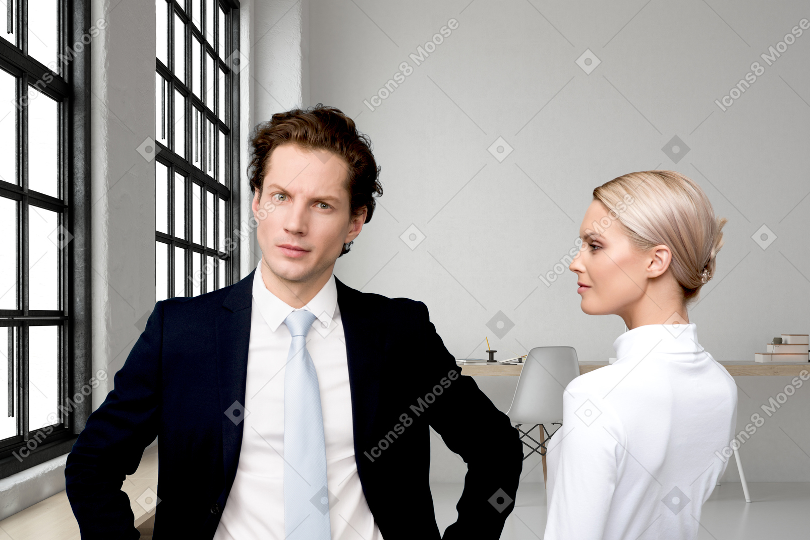 Annoyed businessman and confident woman in the workplace