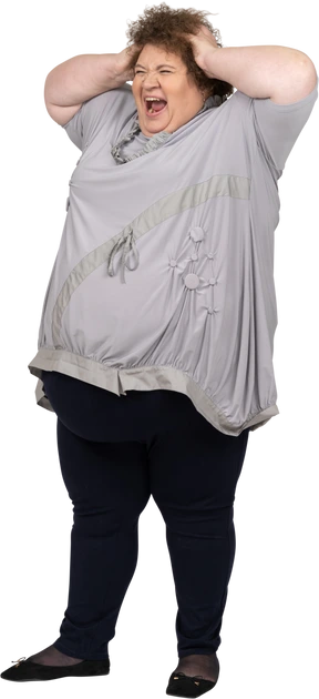 Smiling woman holding her head