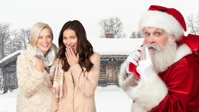 Young women happy to see santa