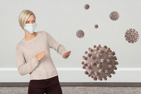 Woman in face mask afraid of coronavirus