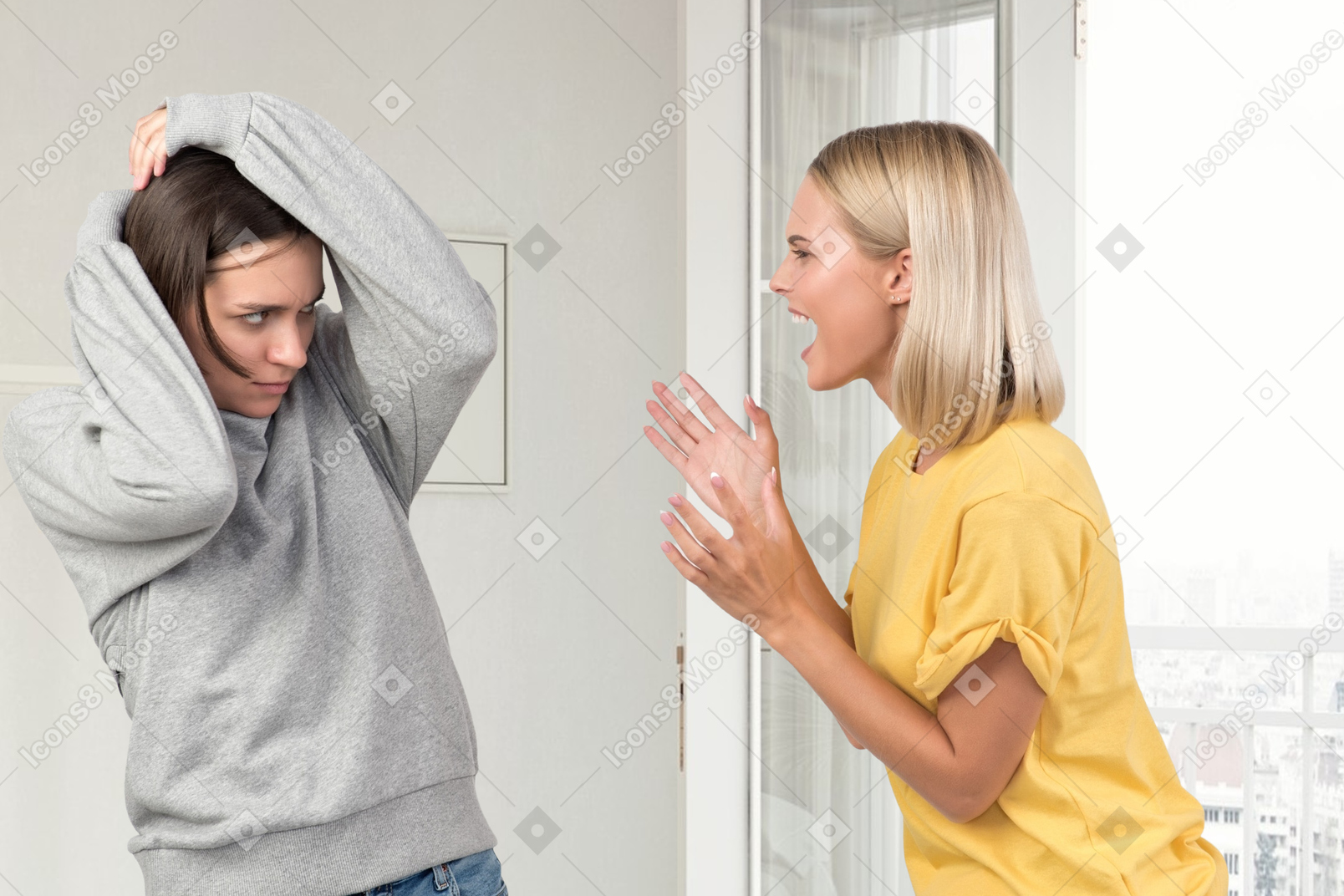 A woman shouting on another woman