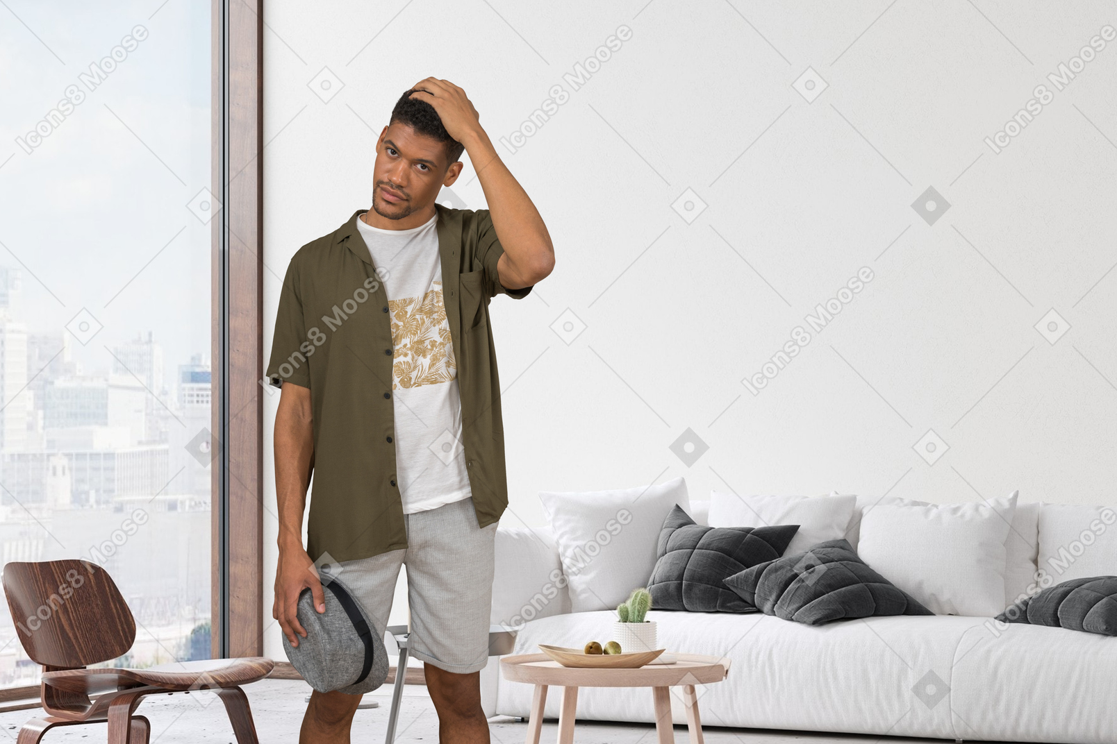 Handsome man standing in a cozy room