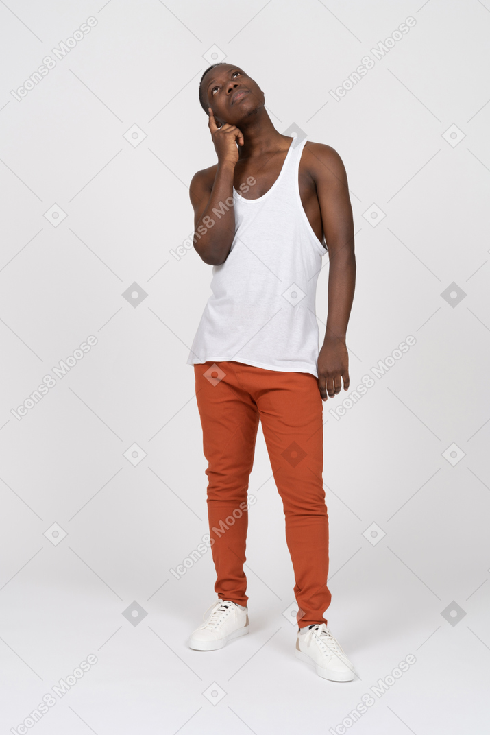 Front view of a man in tank top thinking