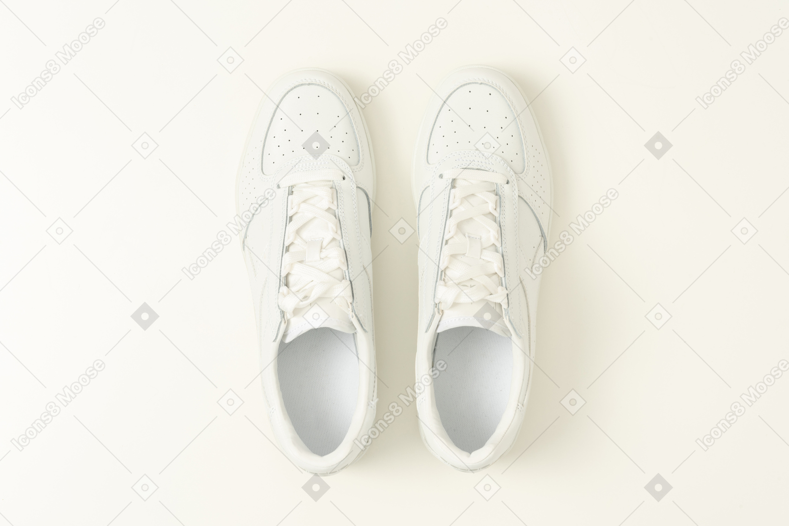 White sneakers on a white background