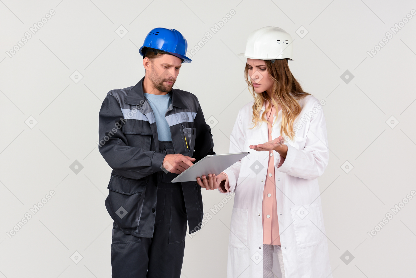 Female and male engineer colleagues discussing some work stuff