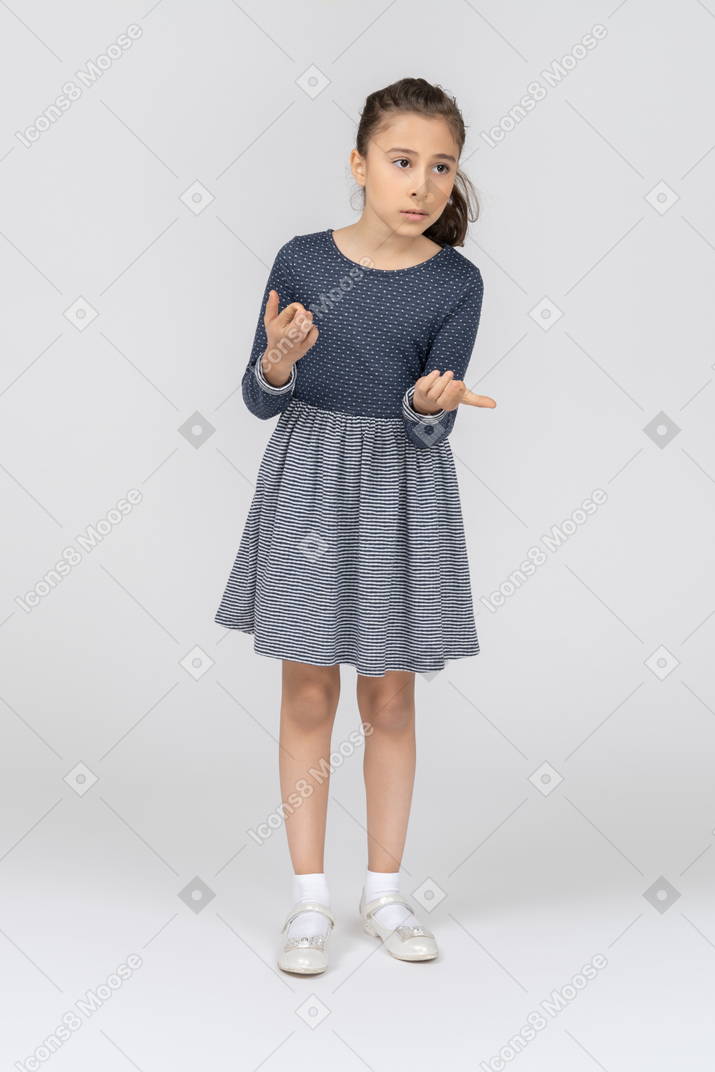 Front view of a girl gesturing in confusion