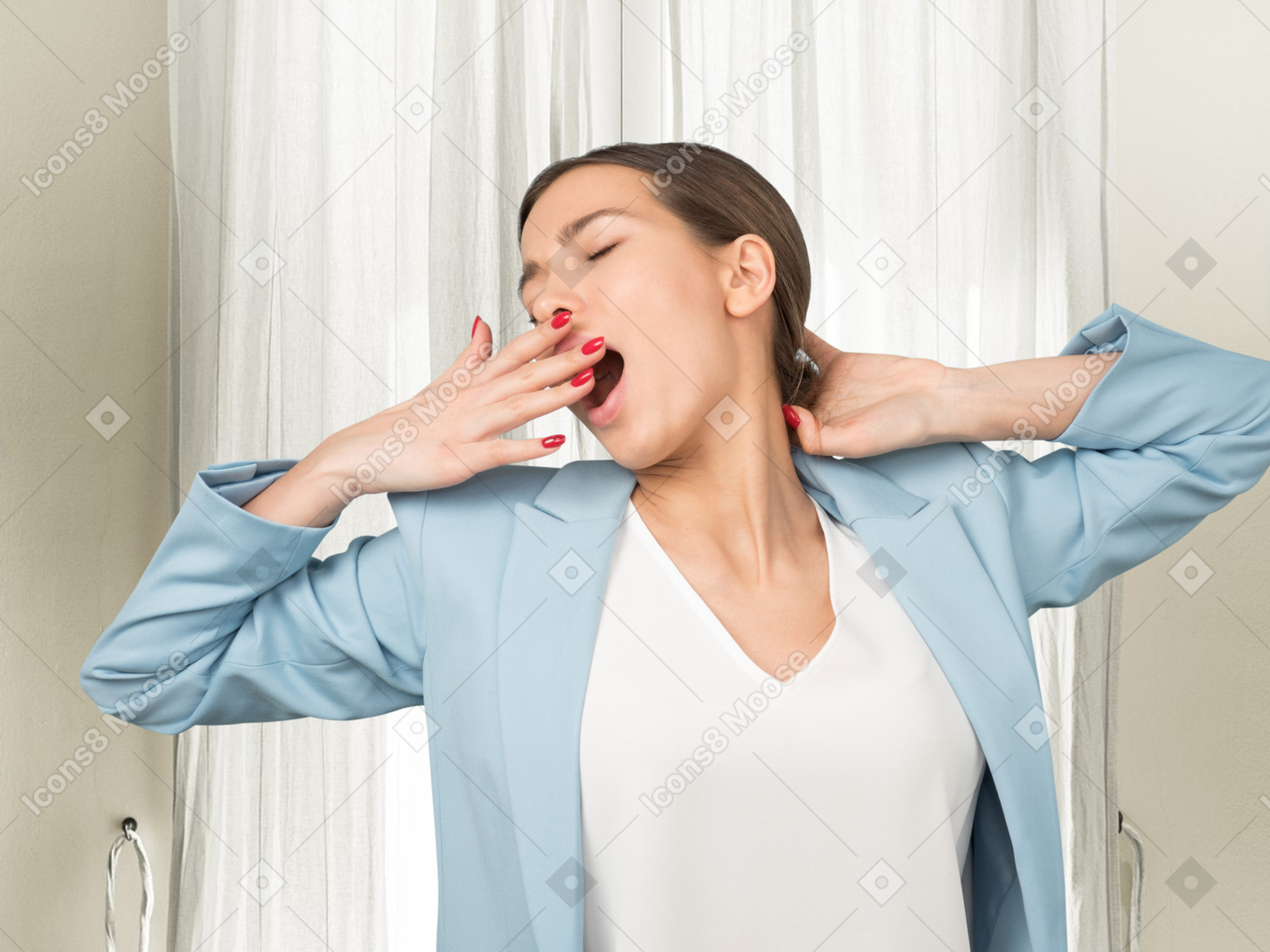 A woman in suit yawning