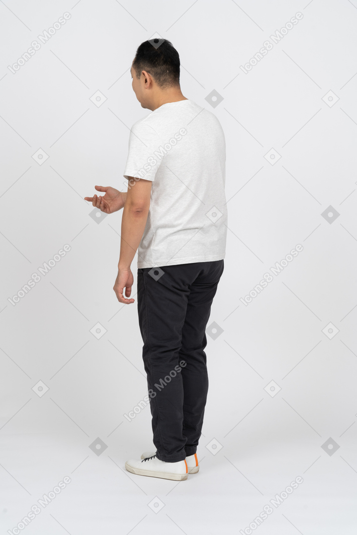 Man in casual clothes talking to someone