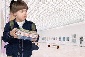 A schoolboy in an art gallery