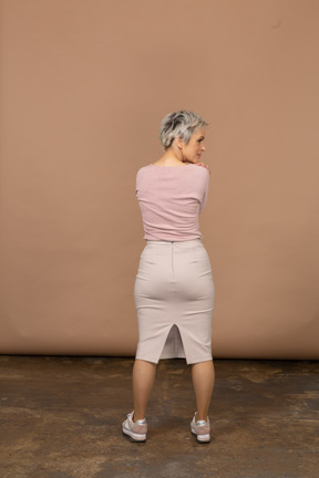 Back view of a woman in casual clothes