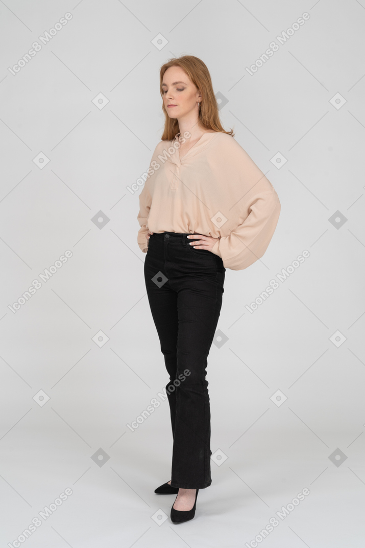 Woman in beautiful blouse standing