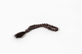 Prayer beads on white background