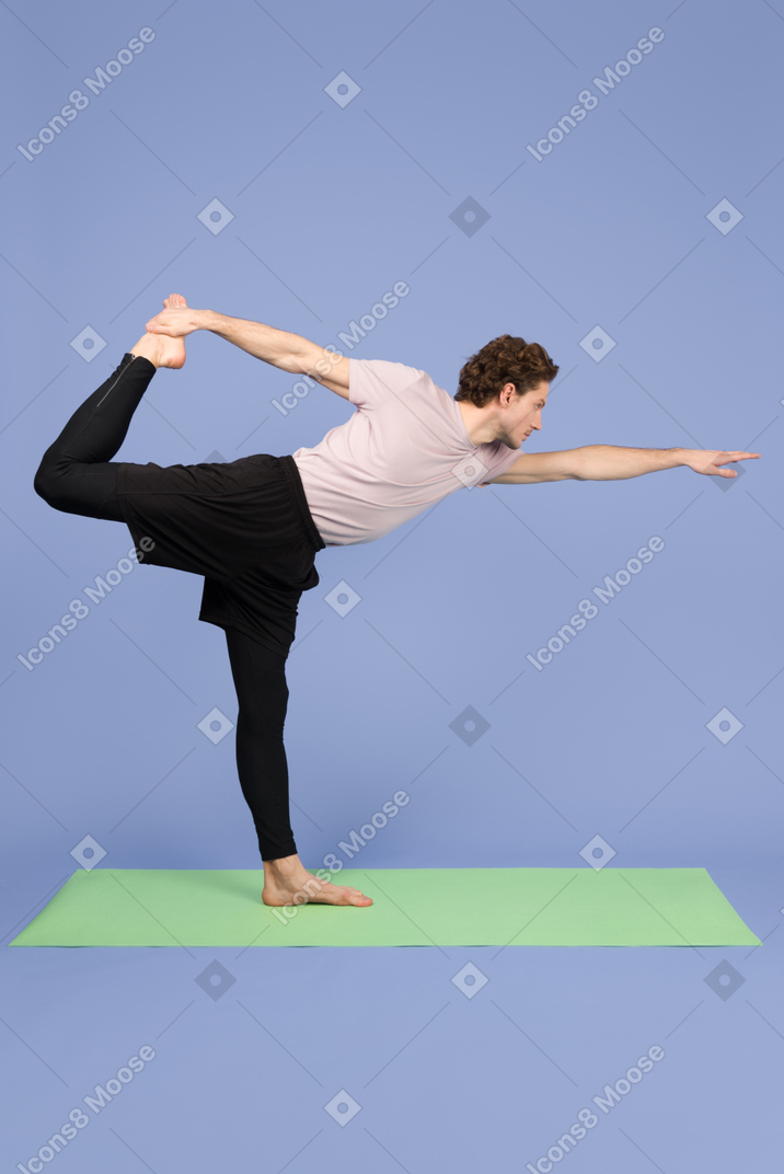 Young man making physical exercises