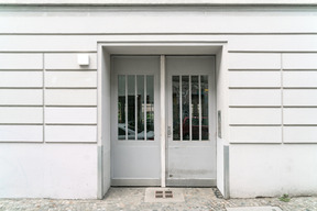 White building with white double door