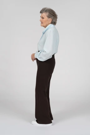 Side view of an old woman looking puzzled