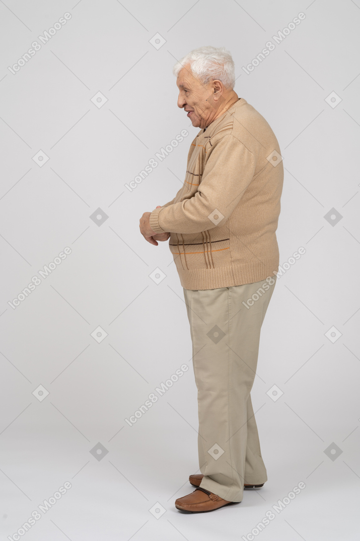 Side view of a happy old man in casual clothes