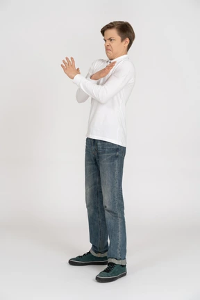 Young man in casual clothes standing