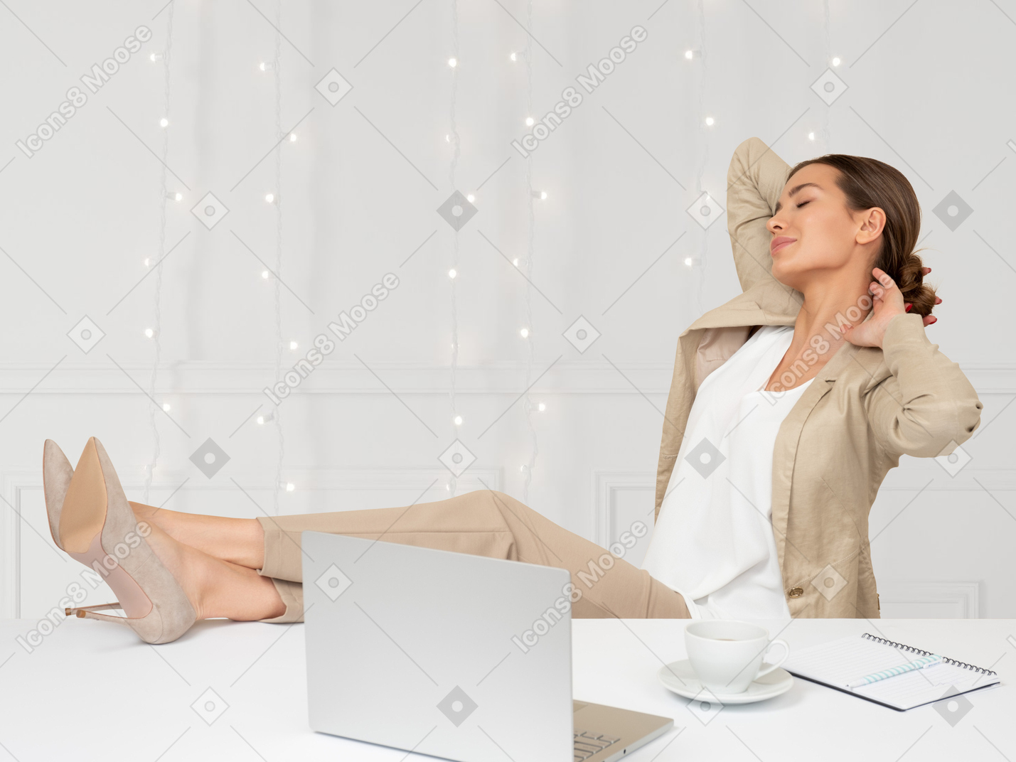 Young woman stretching in the office decorated for christmas
