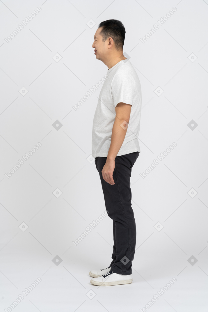 Side view of a sad man in casual clothes