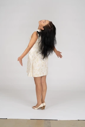 Woman in beautiful dress standing