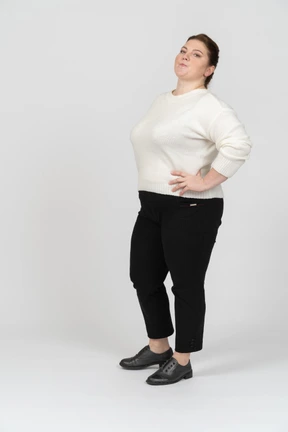 Confident plump woman in casual clothes