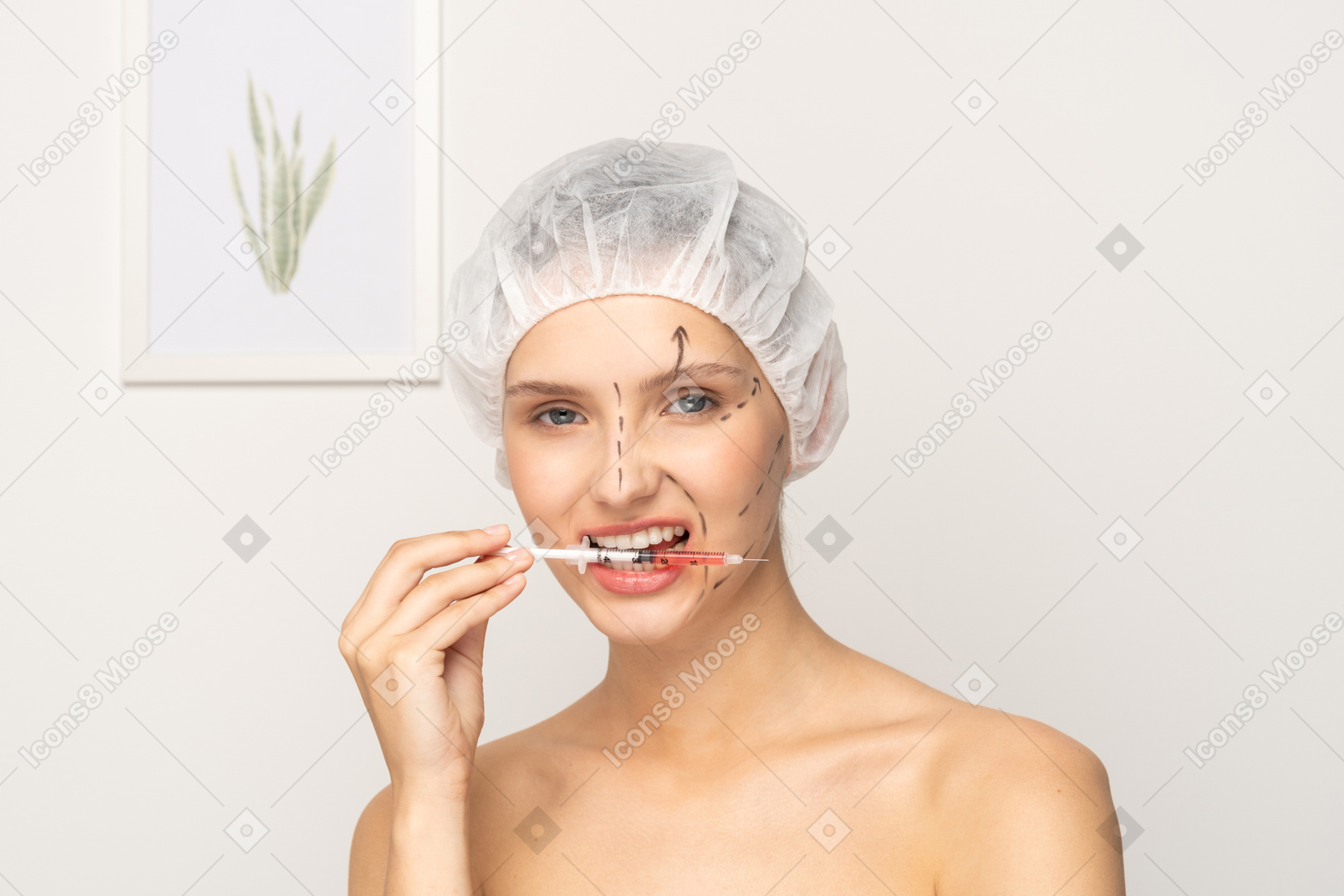 注射器を口に入れる若い女性