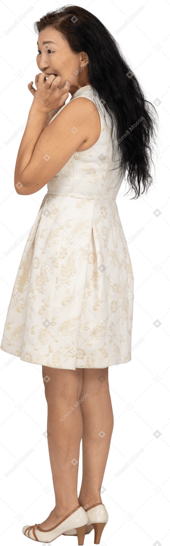 Woman in beautiful dress standing