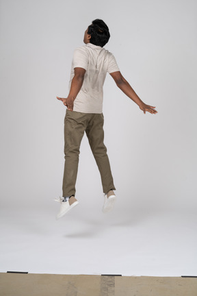 Man in casual clothes jumping