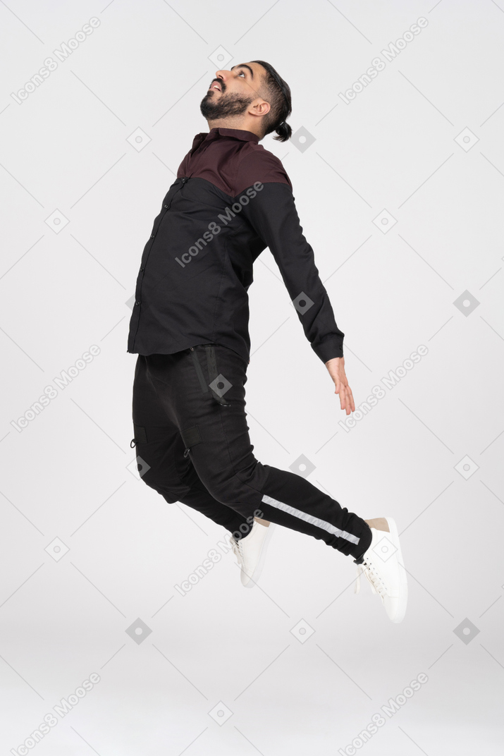A young man jumping up