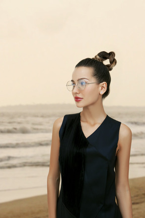 Beautiful young woman at the sea shore