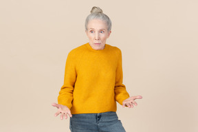 Elegant older woman looking confused