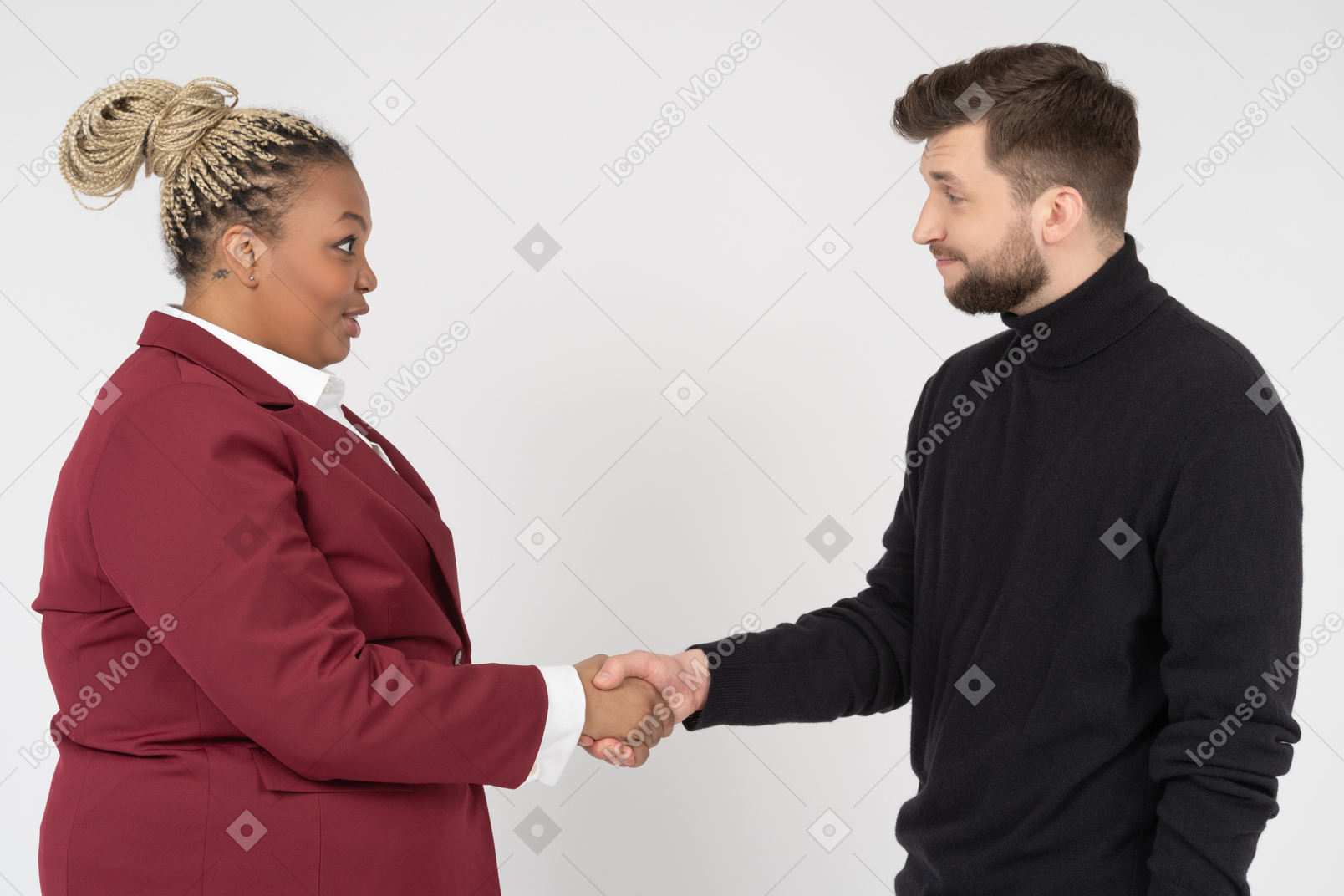 Office workers greeting each other with a handshake