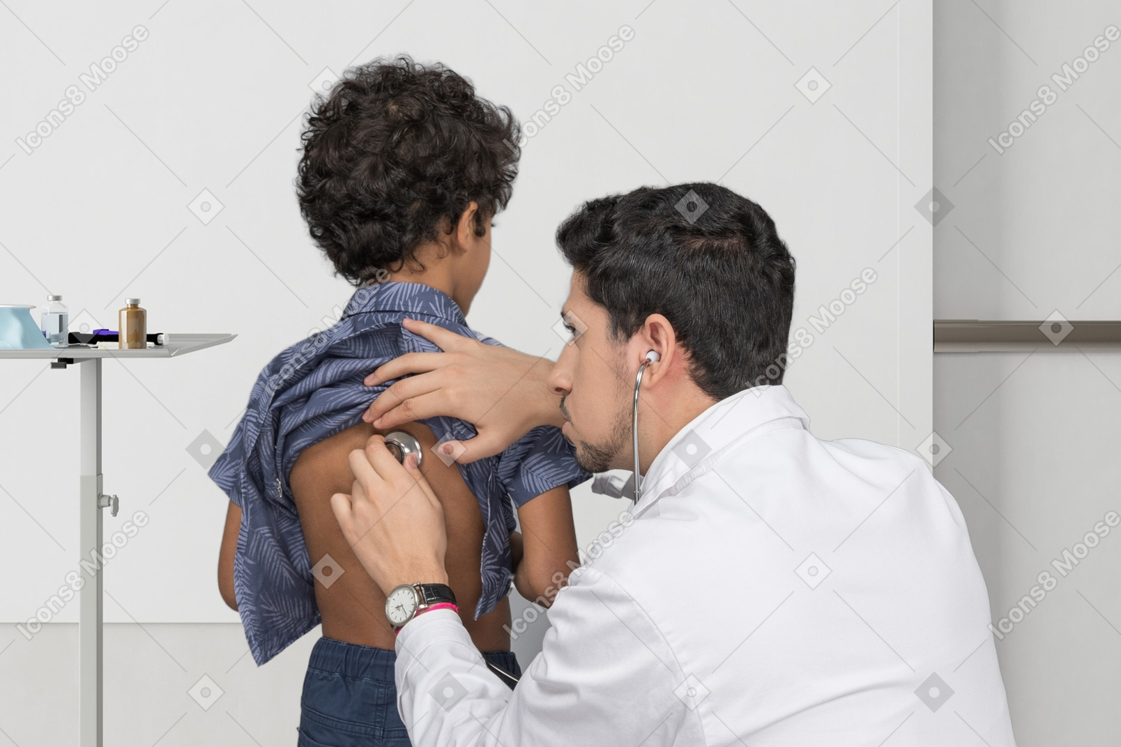 Doctor examining a child with stethoscope