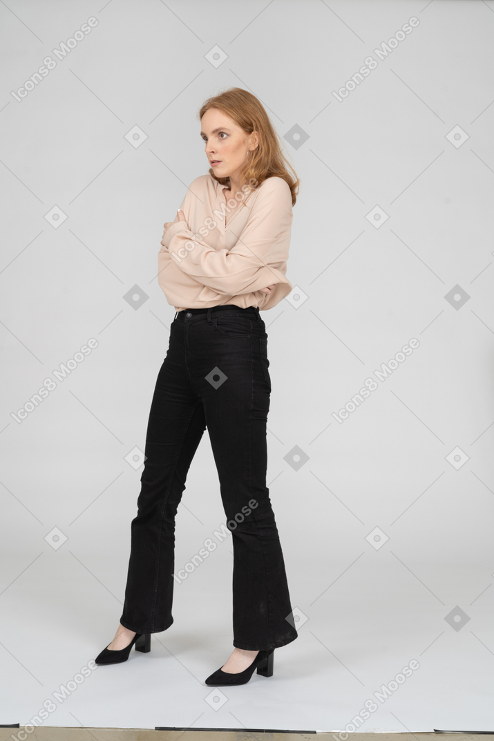 Woman in beautiful blouse standing