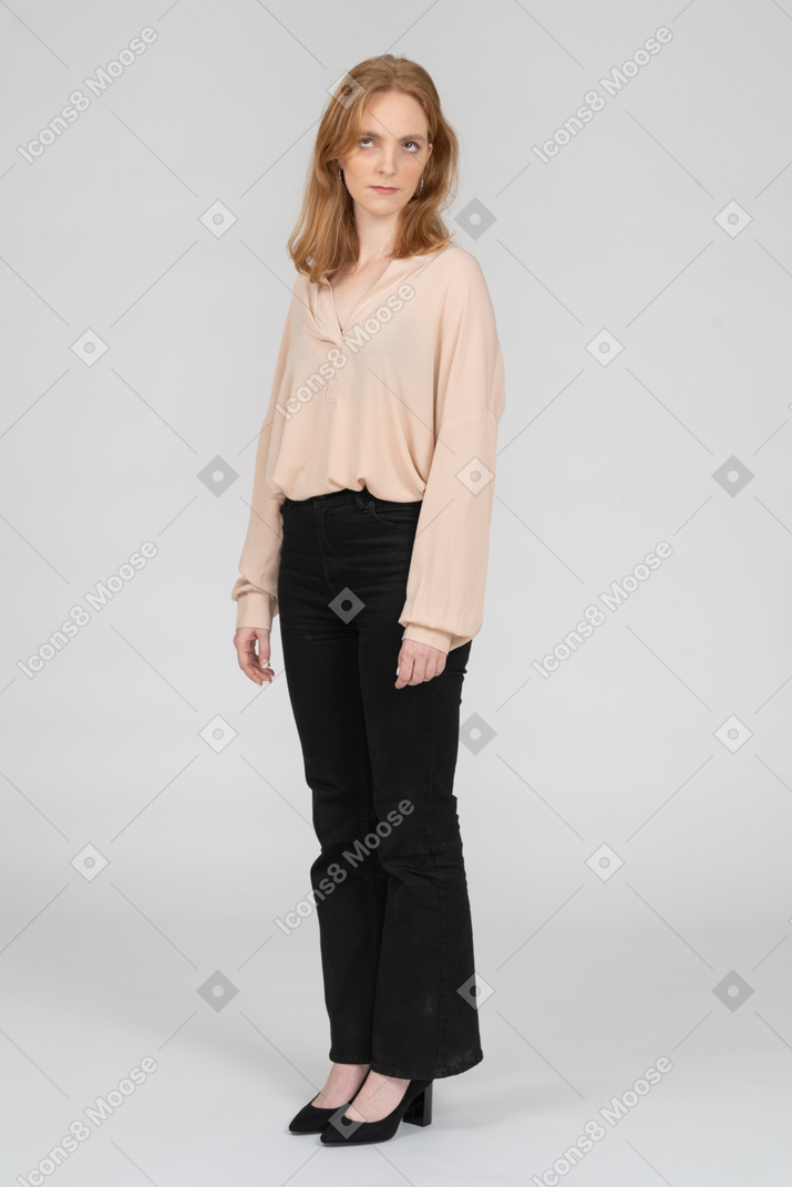 Woman in beautiful blouse standing