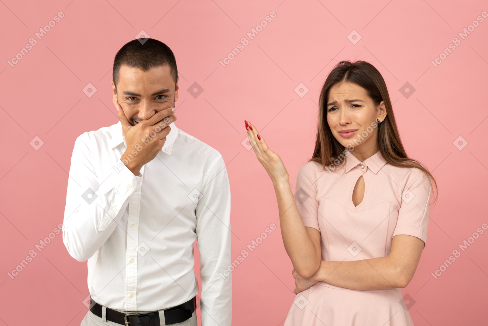 Attractive young woman disapproving of his behavior