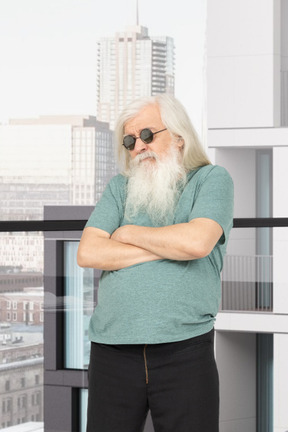 A man with a long white beard wearing sunglasses