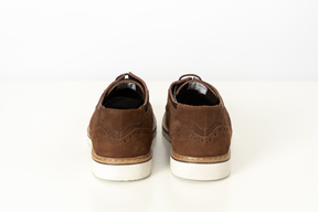 Brown shoes on a white background