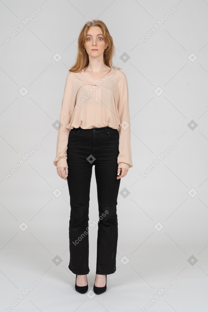 Woman in beautiful blouse standing