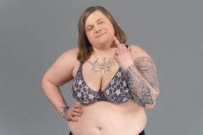 Plump woman showing international gesture